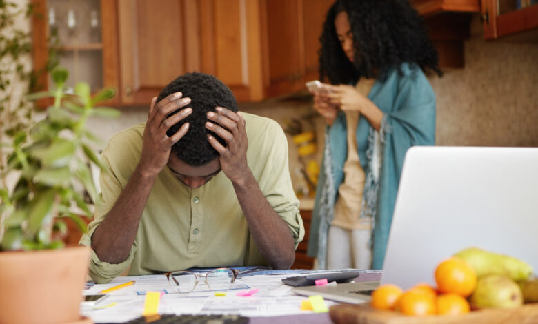 male-feeling-absolutely-devastated-checking-loan-credit
